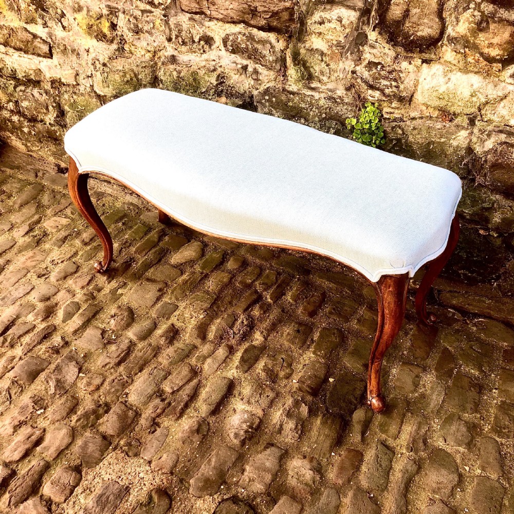 A mid Victorian walnut stool or window seat View II