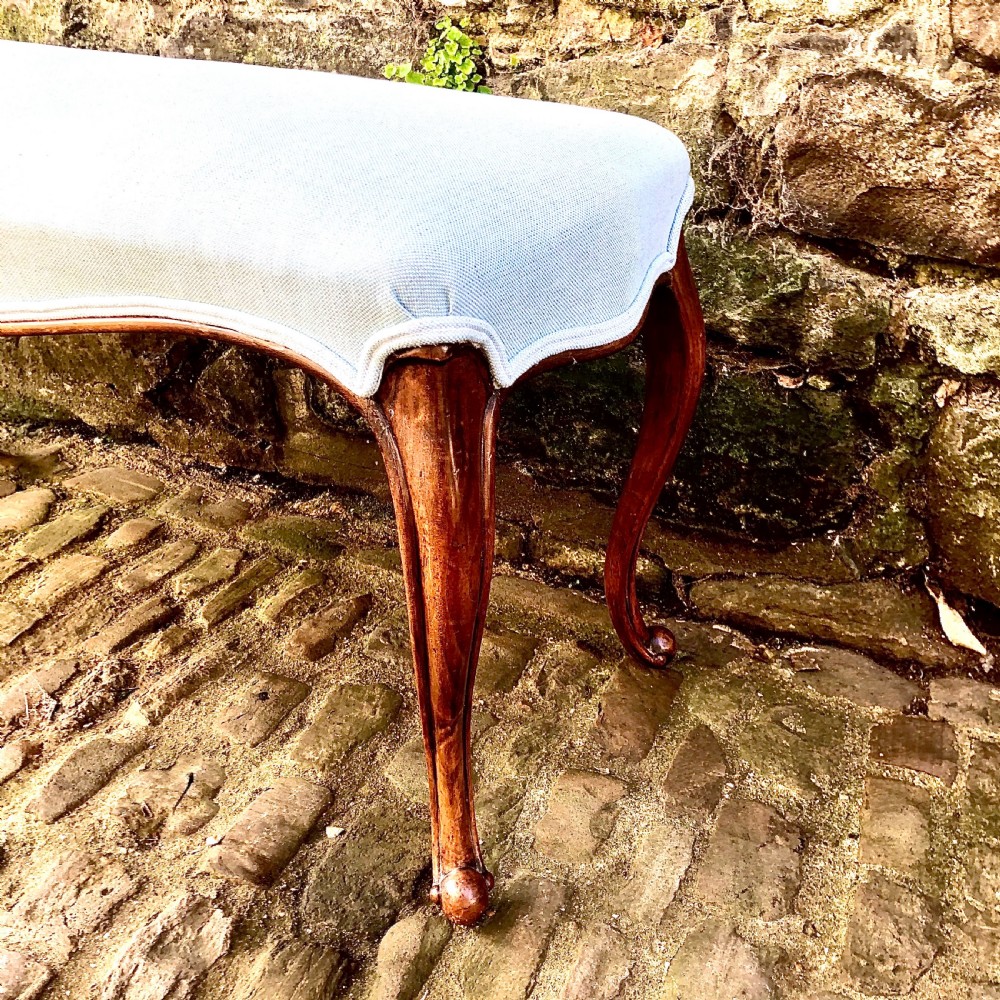 A mid Victorian walnut stool or window seat View III