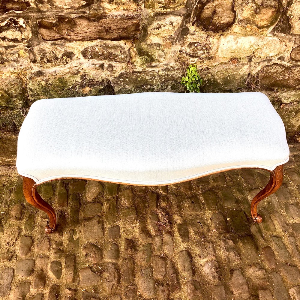 A mid Victorian walnut stool or window seat View IV