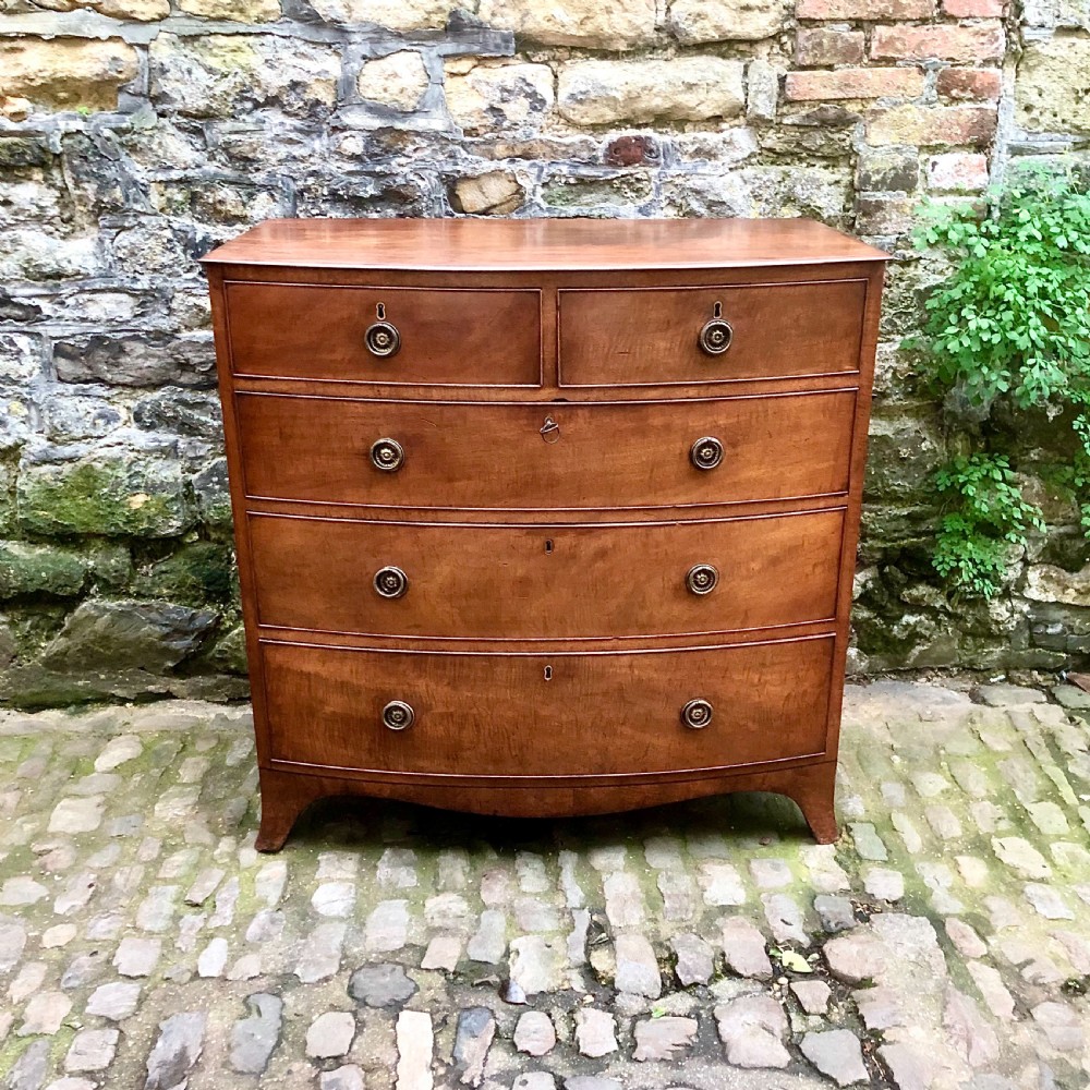 A Regency bowfront chest of drawers 
