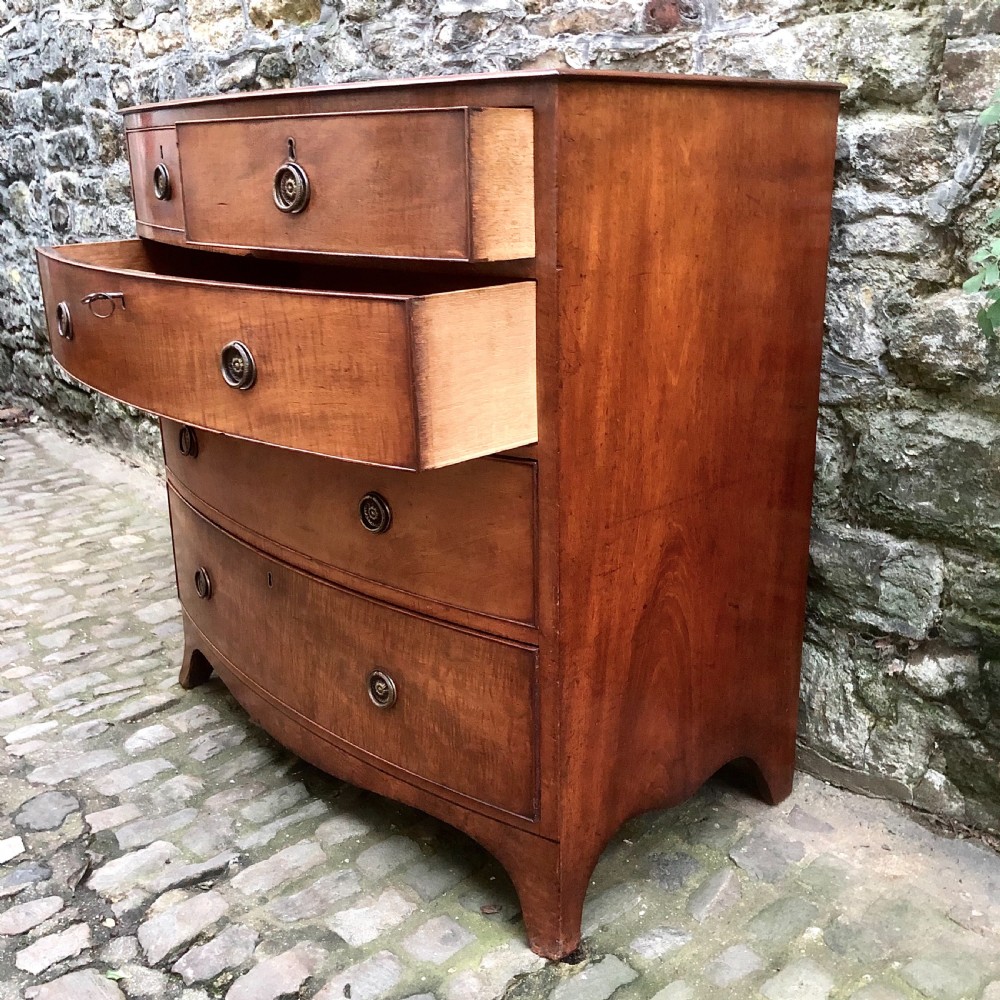 A Regency bowfront chest of drawers  View IV