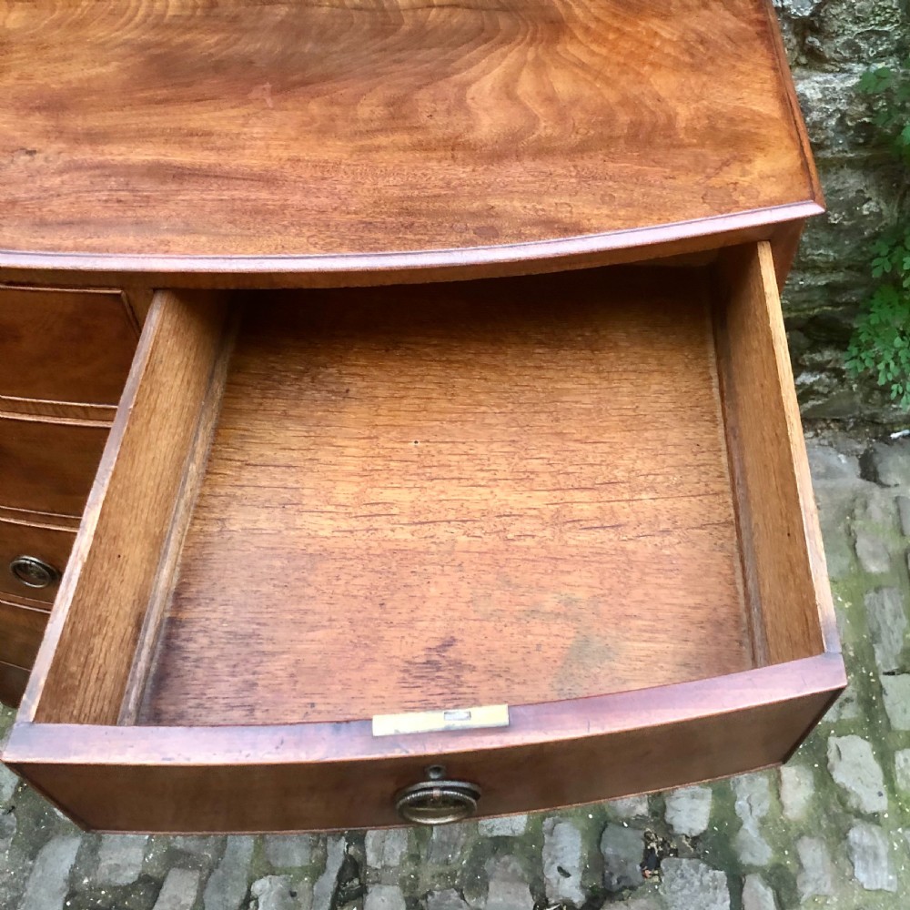 A Regency bowfront chest of drawers  View VI