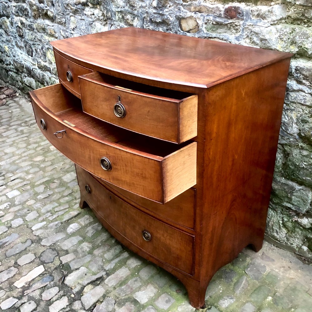 A Regency bowfront chest of drawers  View VII