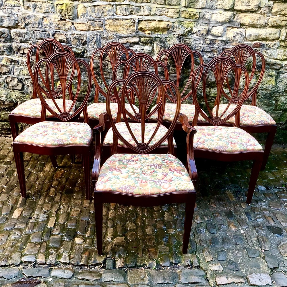 A set of eight Sheraton Revival mahogany dining chairs 