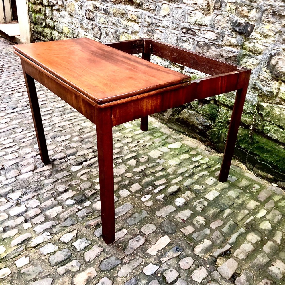 A George III mahogany card table View VI