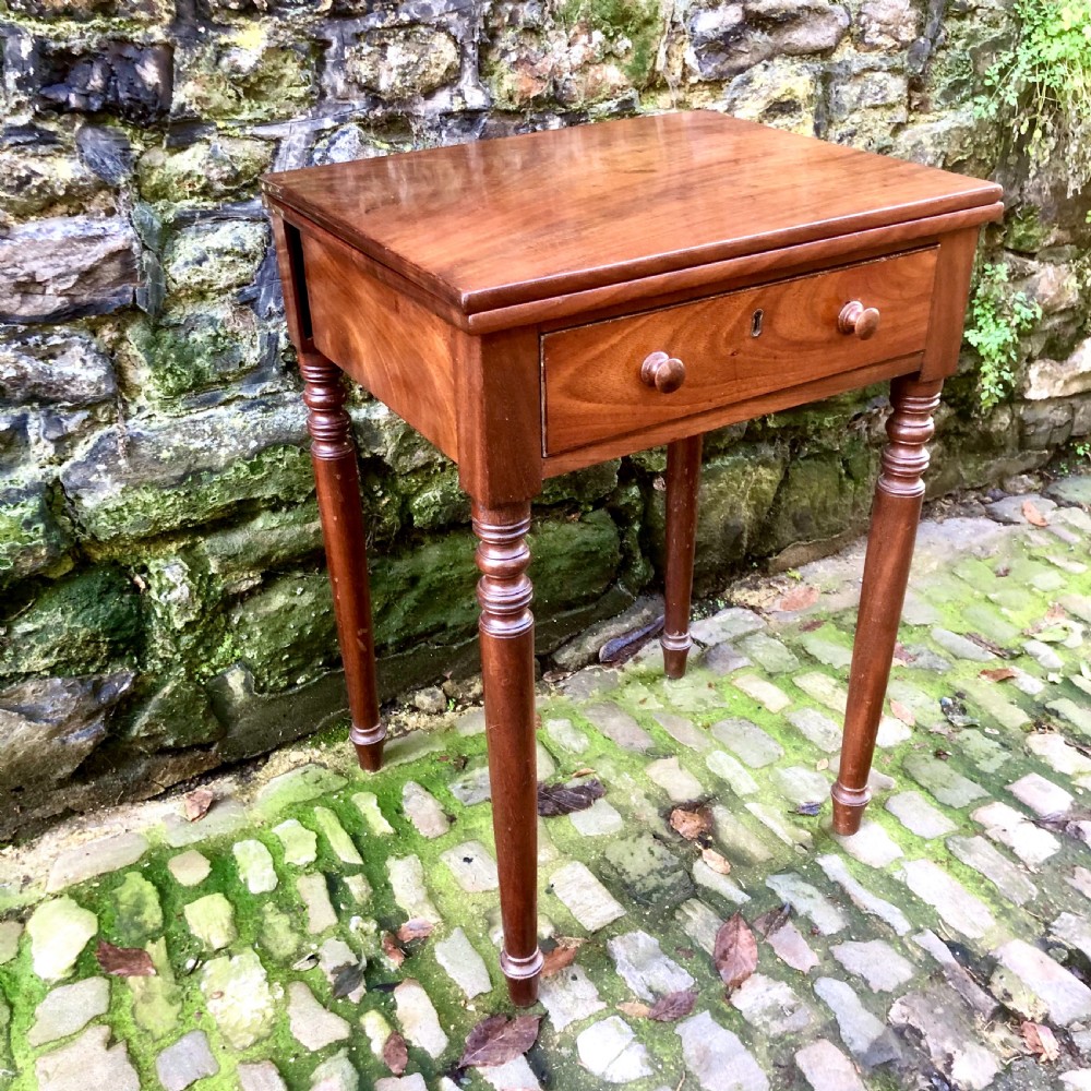 An early 19th century mahogany card table  View III