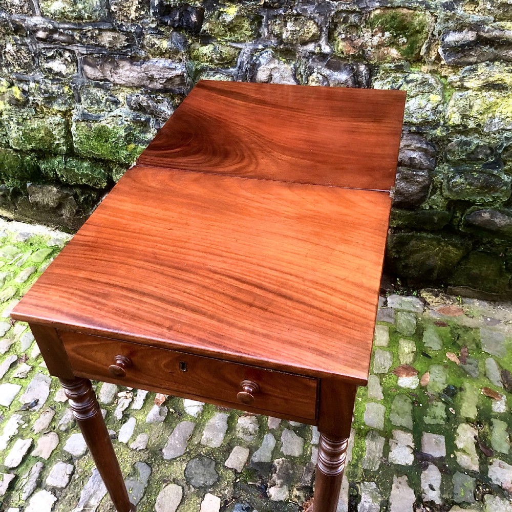 An early 19th century mahogany card table  View IX