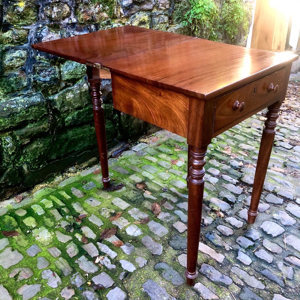 An early 19th century mahogany card table  View X