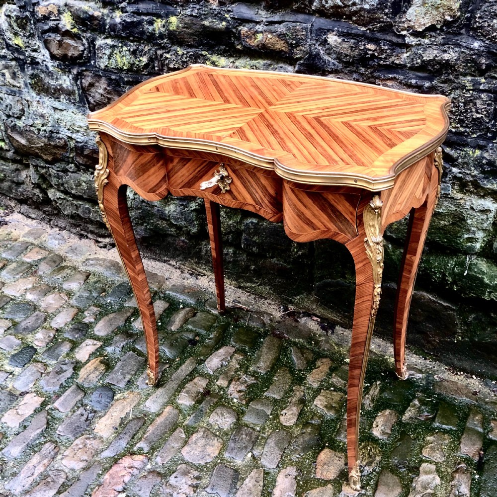 A fine Louis XV style kingwood side table  View II