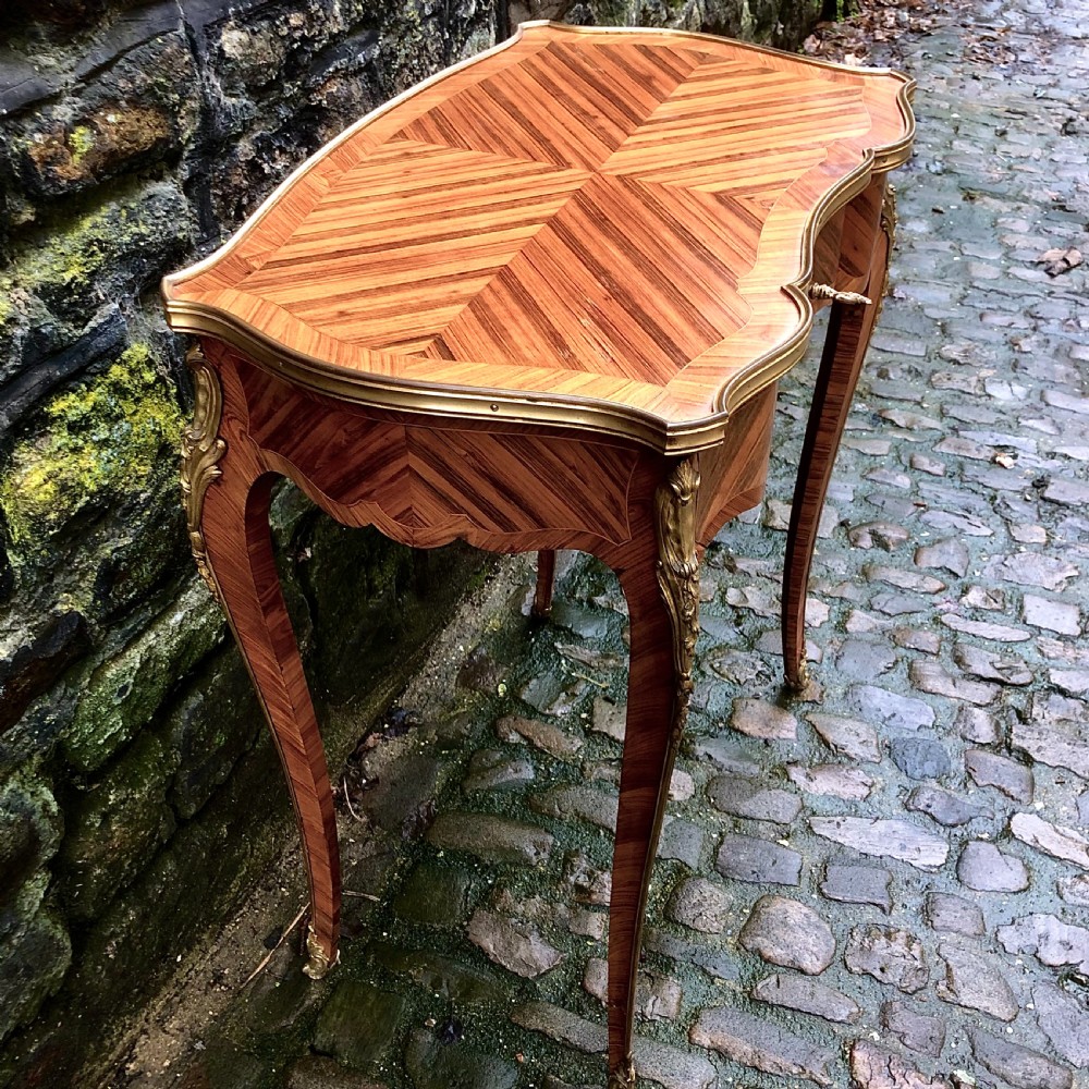 A fine Louis XV style kingwood side table  View VII