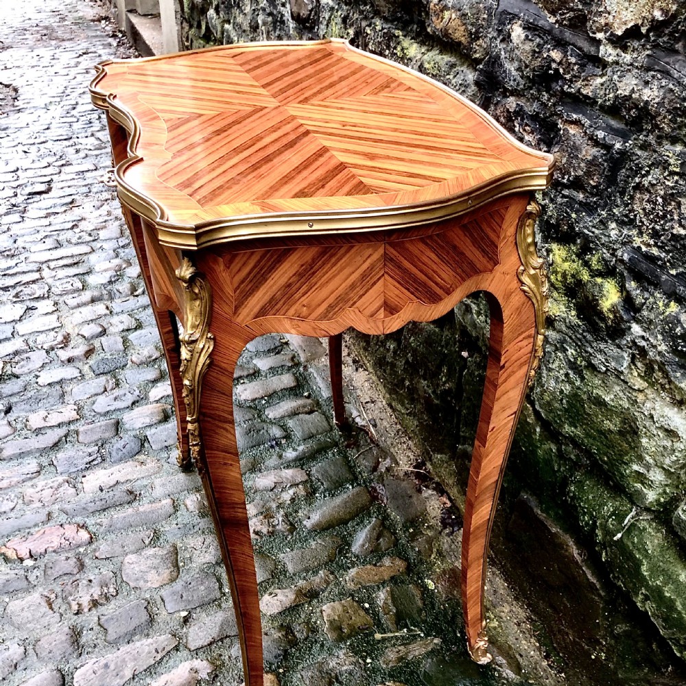 A fine Louis XV style kingwood side table  View VIII