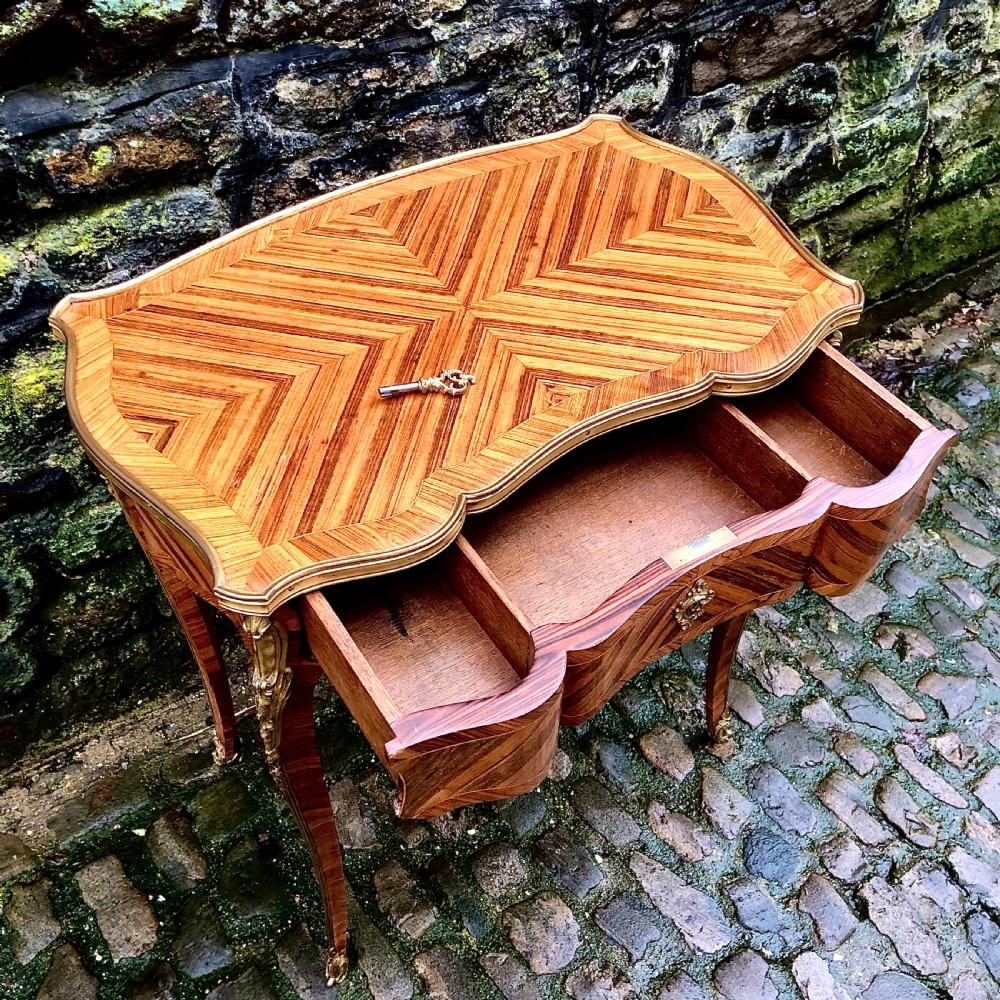 A fine Louis XV style kingwood side table  View IX