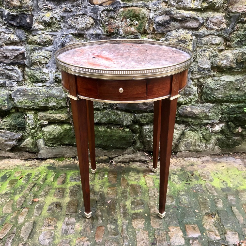 A late 19th century French mahogany bouillotte lamp table 