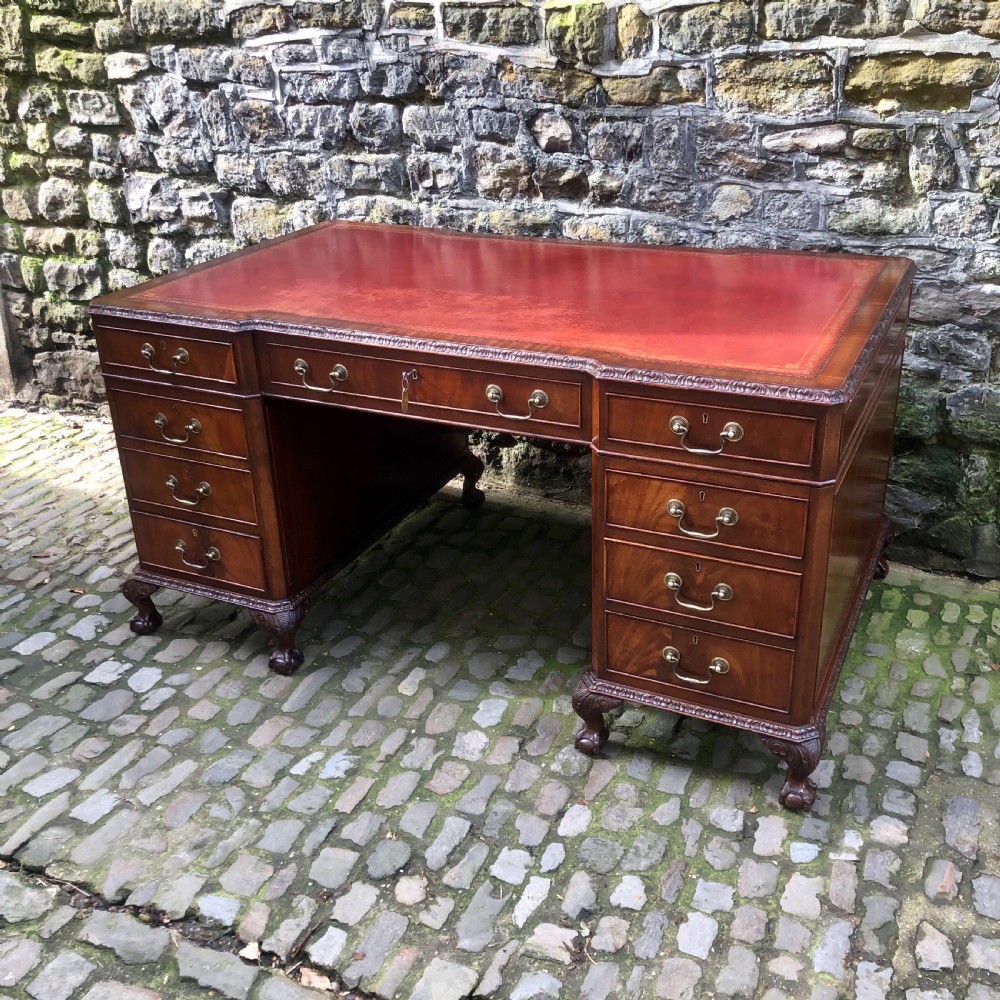A large Edwardian freestanding mahogany pedestal desk  View II