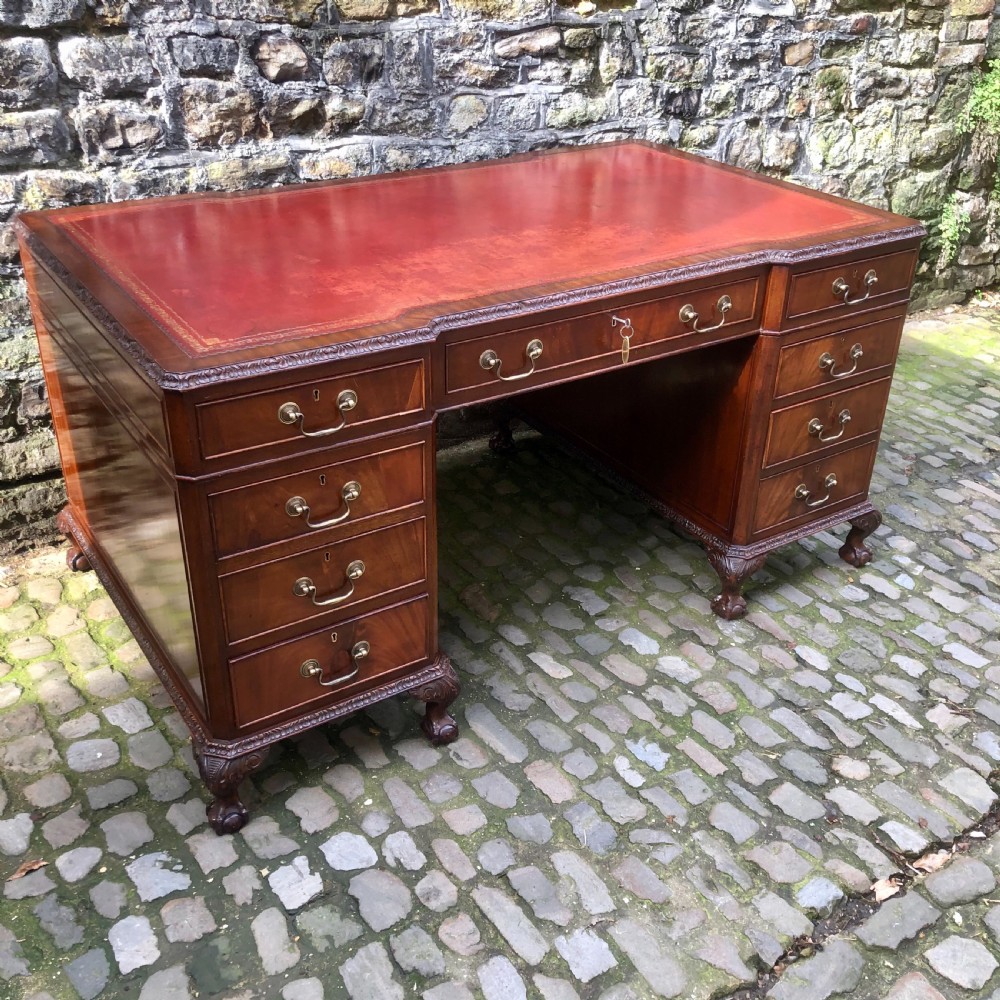 A large Edwardian freestanding mahogany pedestal desk  View III