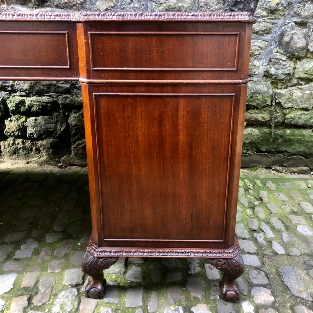 A large Edwardian freestanding mahogany pedestal desk  View X