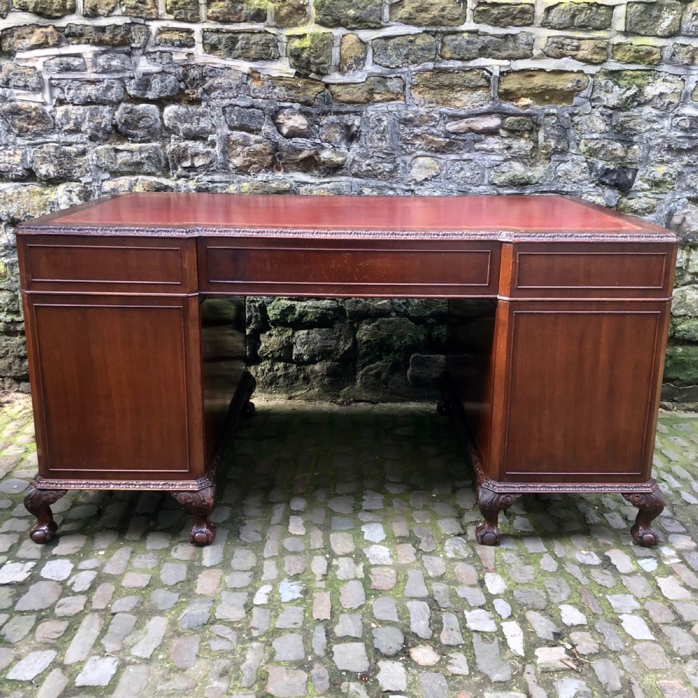 A large Edwardian freestanding mahogany pedestal desk  View XI