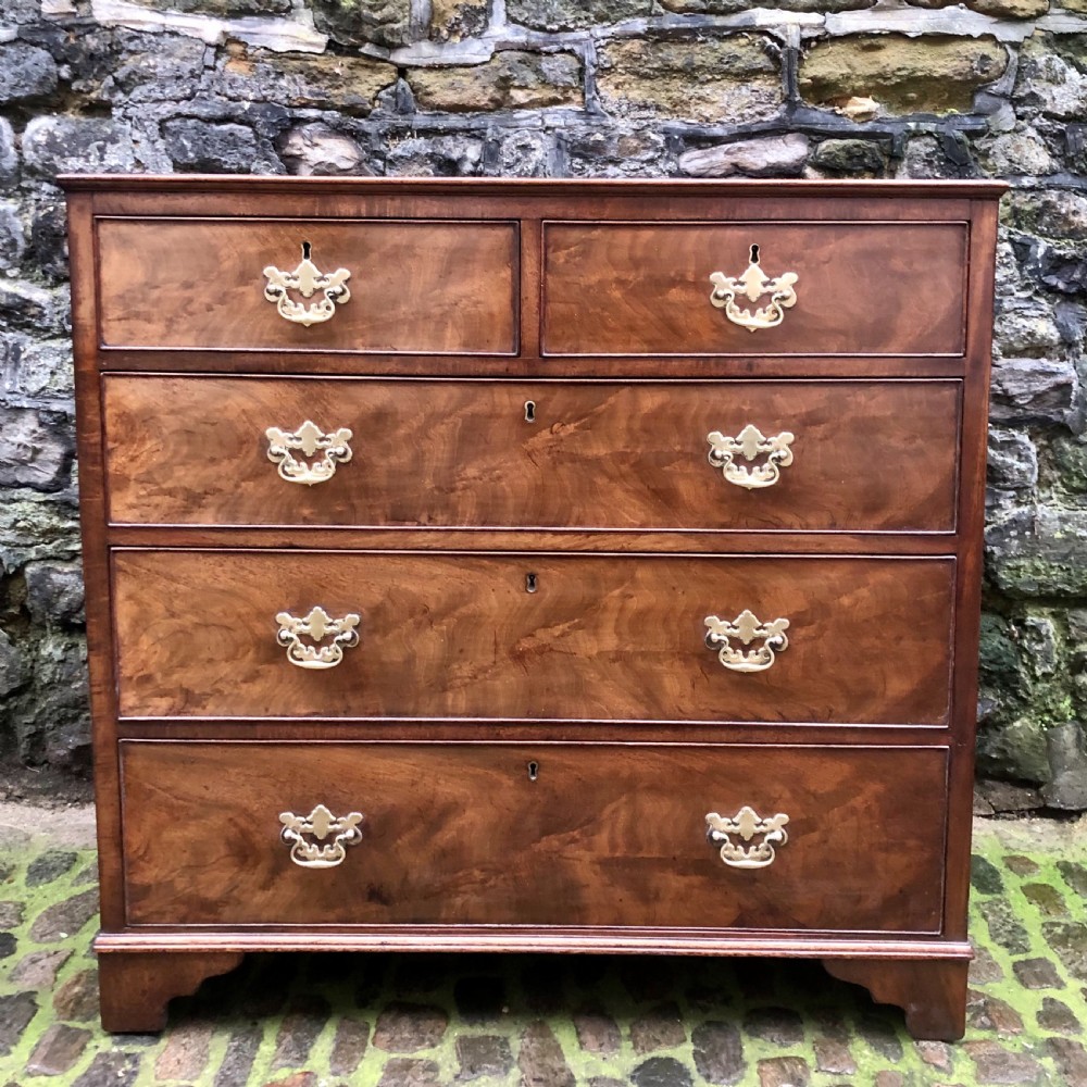 A George II walnut chest of drawers 
