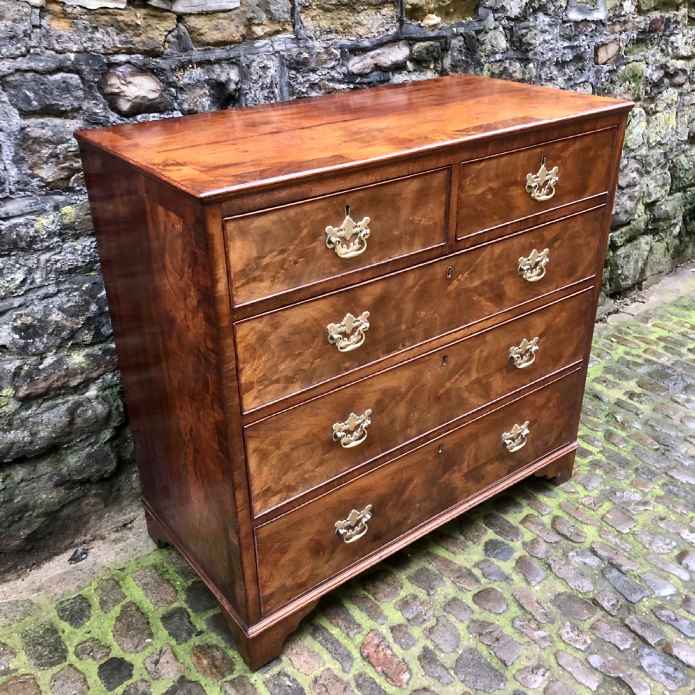 A George II walnut chest of drawers  View III