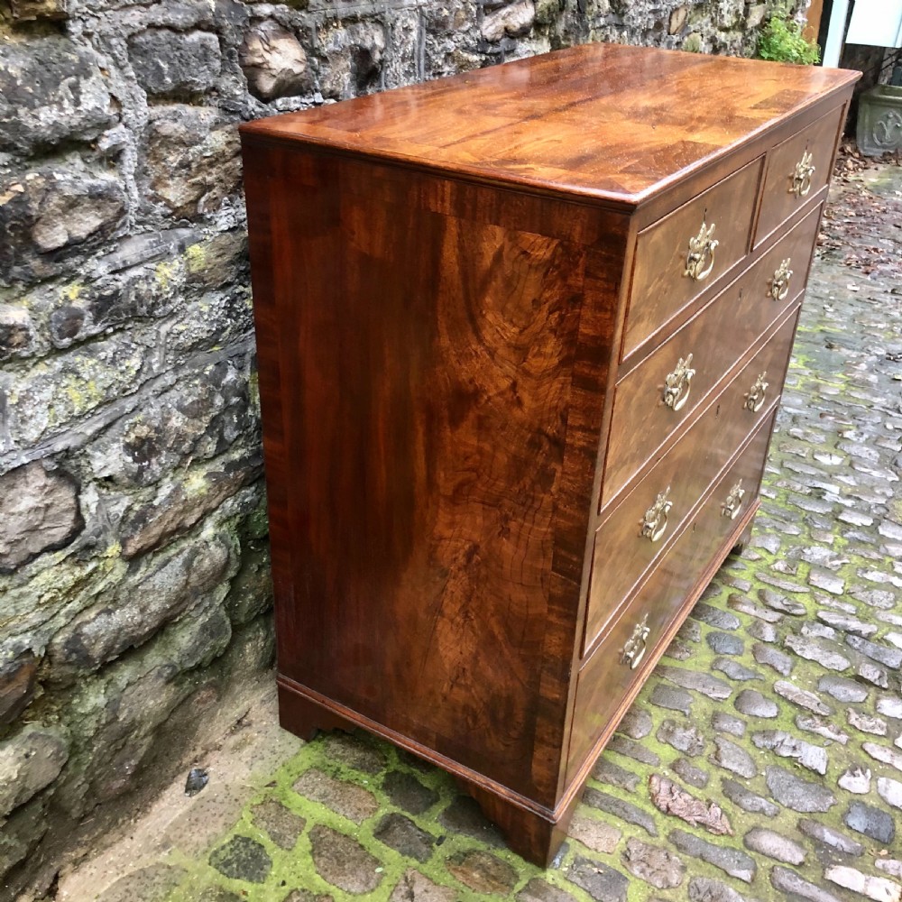 A George II walnut chest of drawers  View V