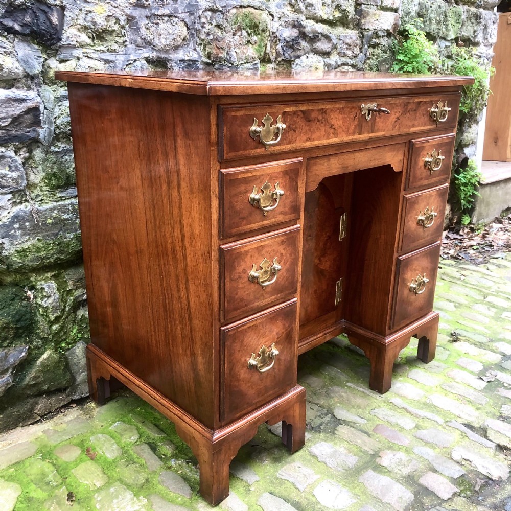 An early 20th century walnut kneehole desk View IV