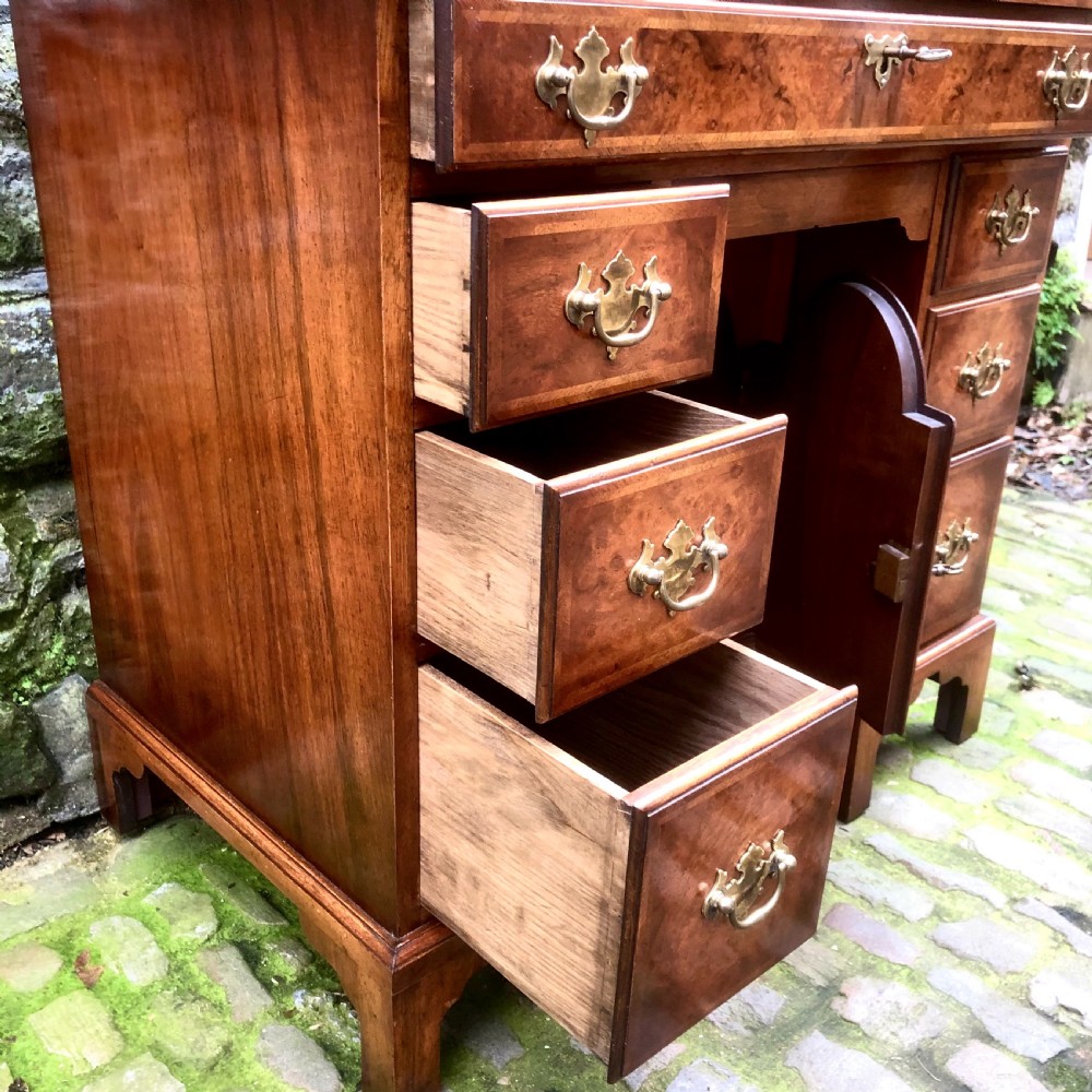 An early 20th century walnut kneehole desk View VII