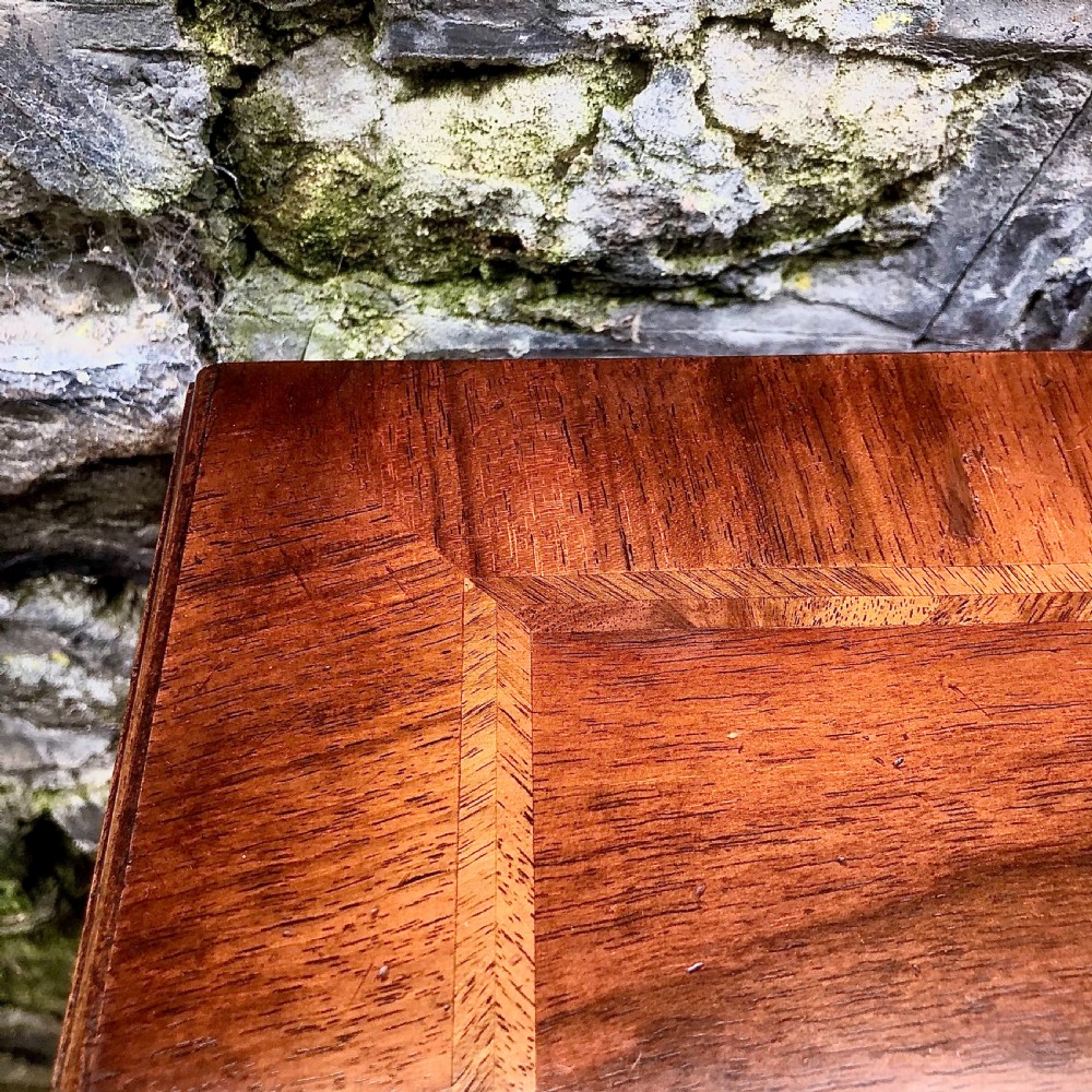 An early 20th century walnut kneehole desk View X