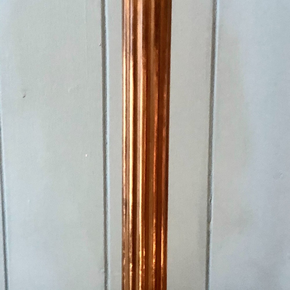 An early twentieth-century brass table lamp shaped as a fluted Corinthian column on a square stepped base. View III