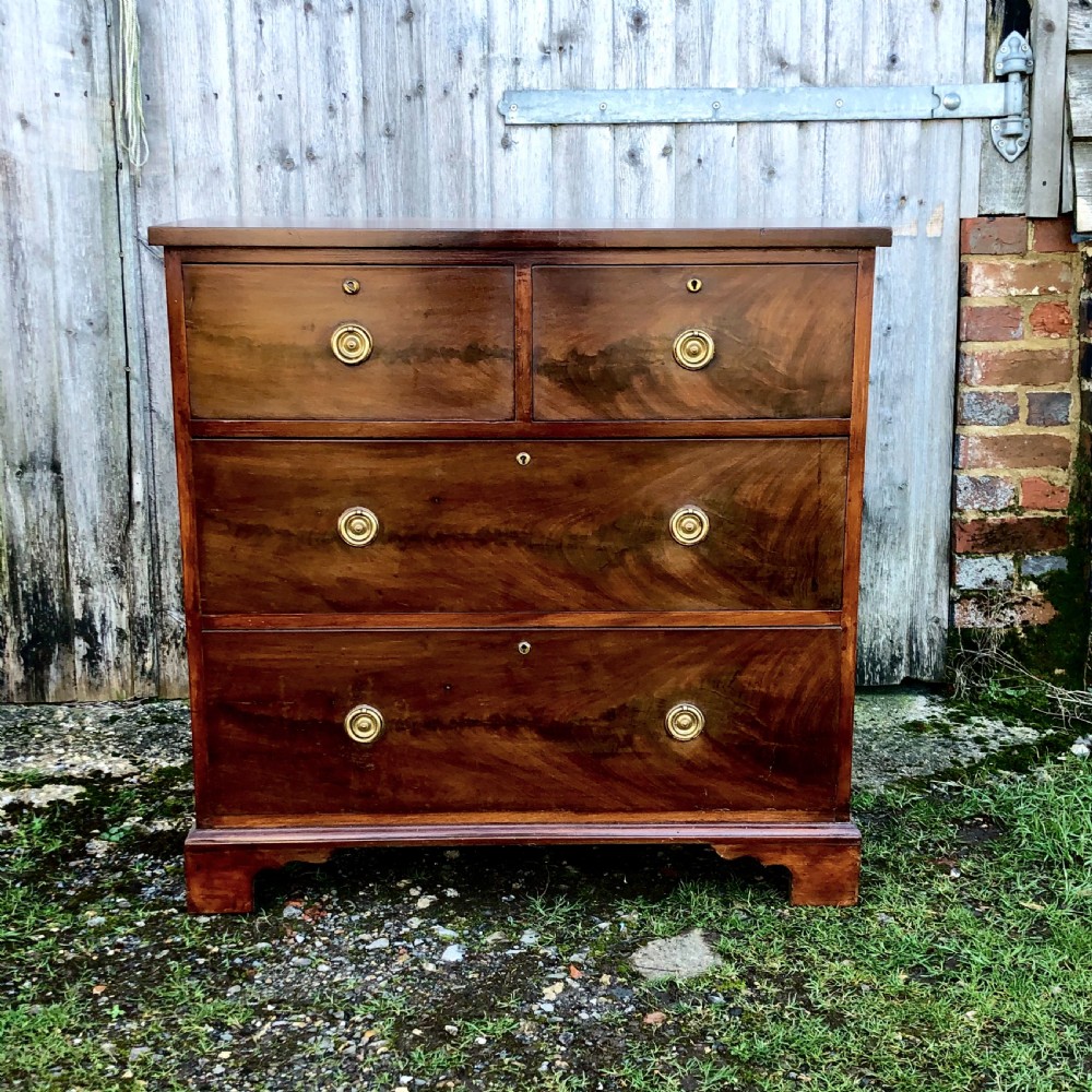 A George IV mahogany chest of drawers View II