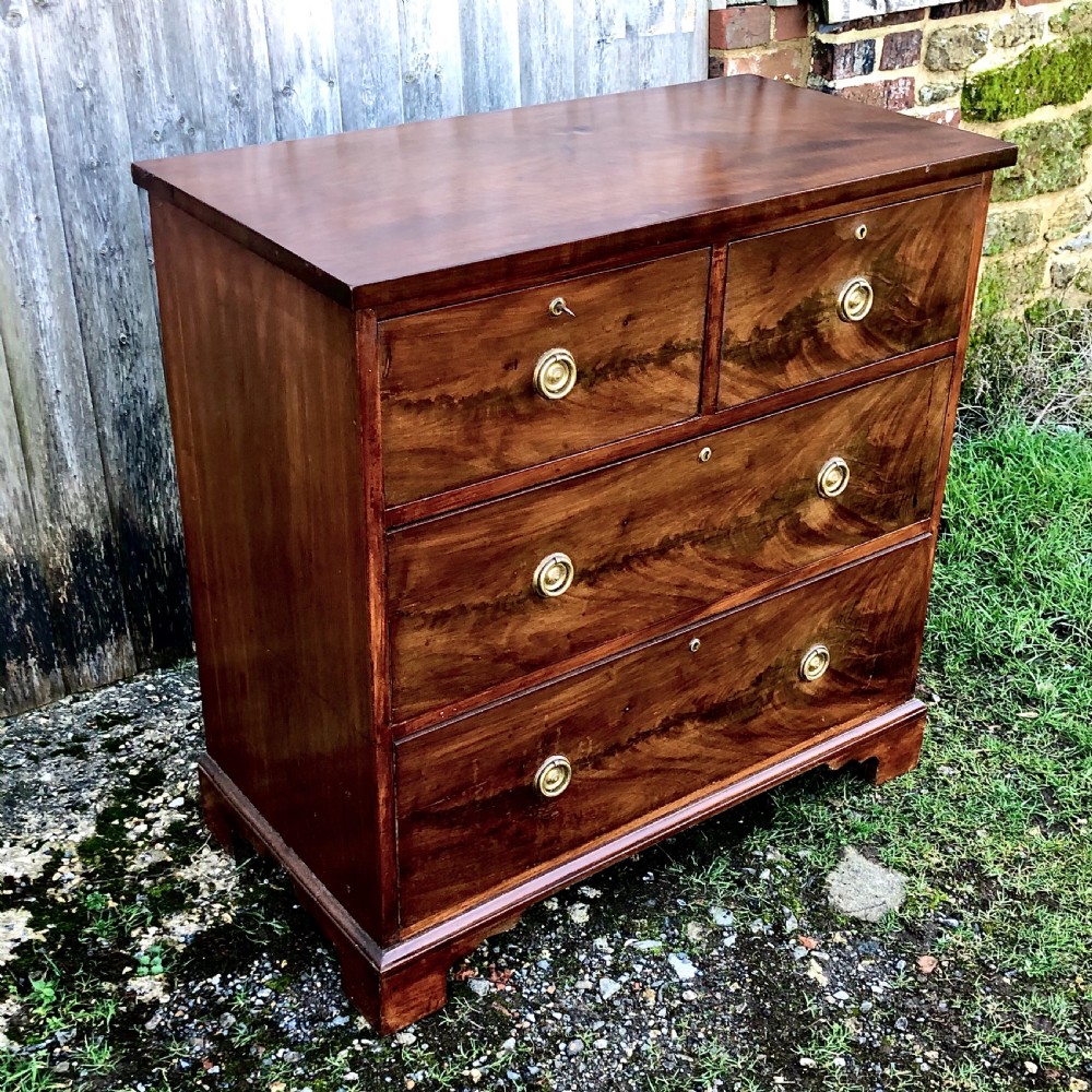 A George IV mahogany chest of drawers View III
