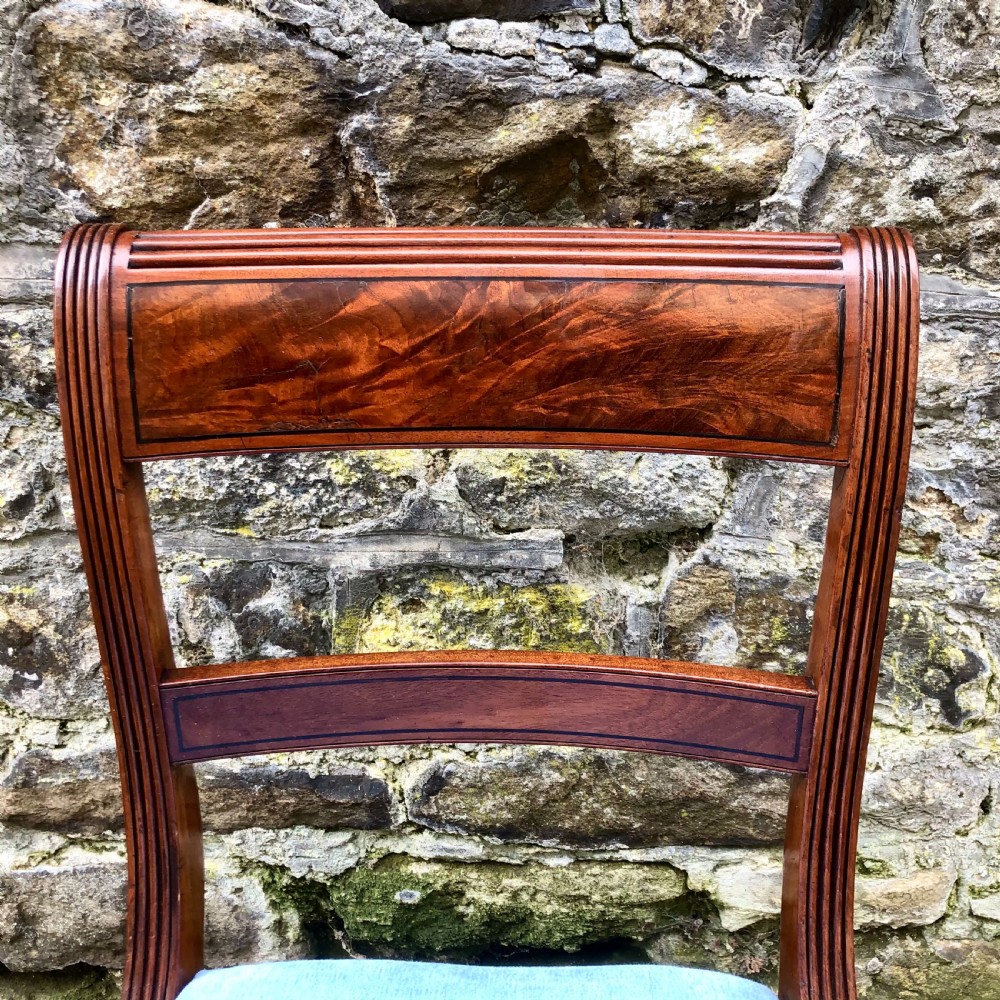 A set of eight Regency mahogany dining chairs  View XI