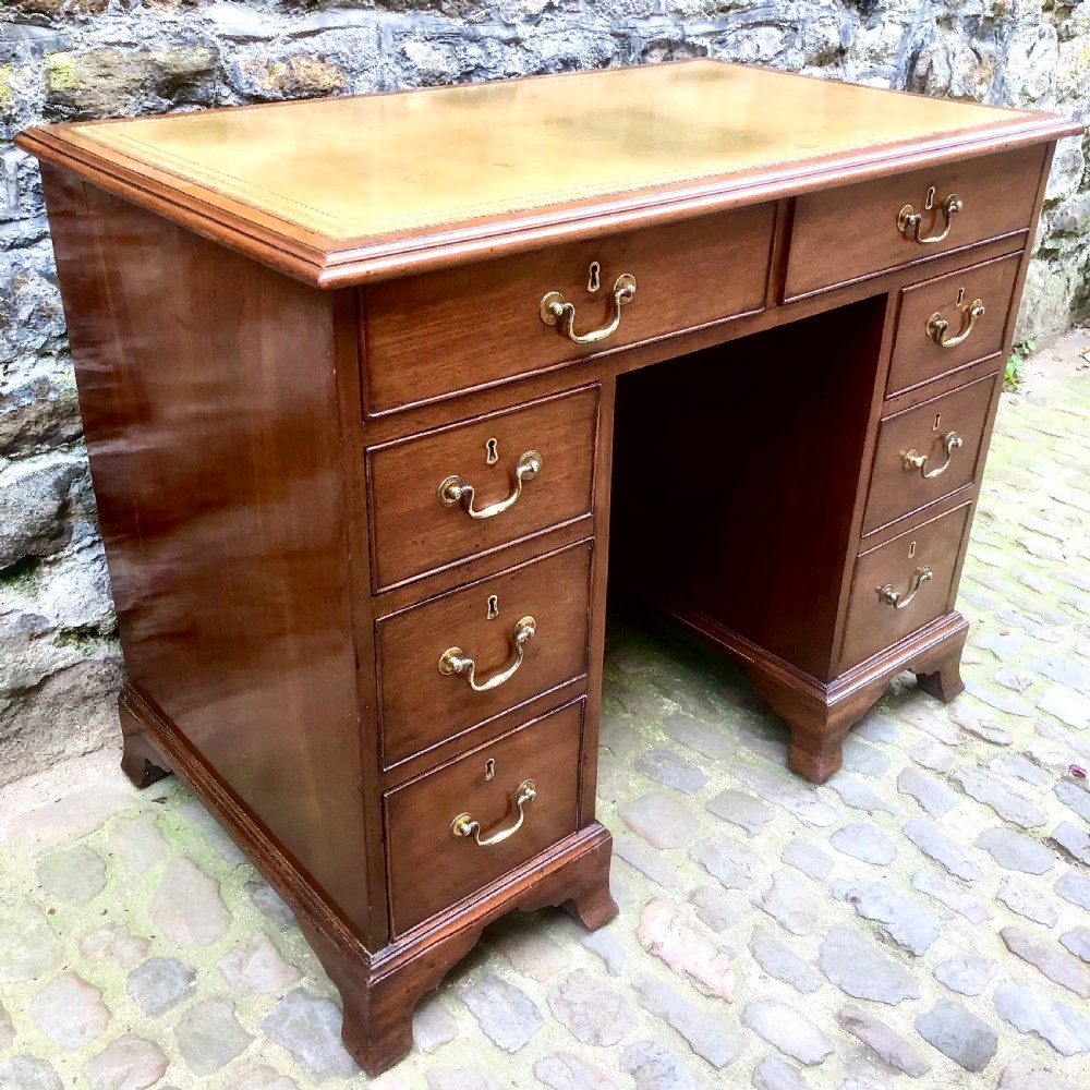 A small mid Victorian mahogany kneehole desk  View II