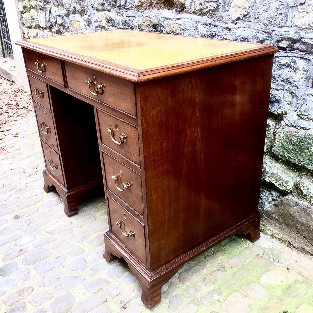A small mid Victorian mahogany kneehole desk  View III