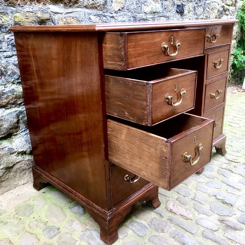 A small mid Victorian mahogany kneehole desk  View VII