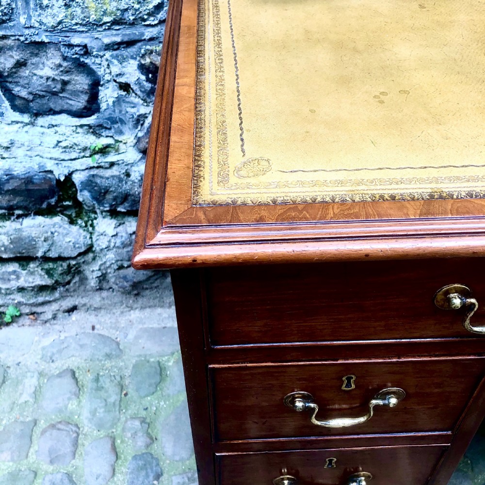 A small mid Victorian mahogany kneehole desk  View IX