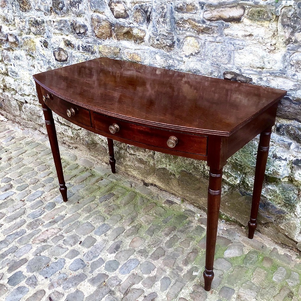 A George III mahogany bowfront side table View III