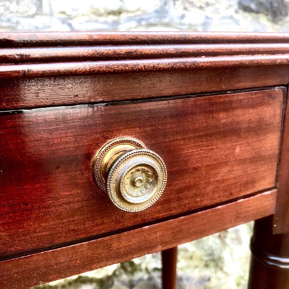 A George III mahogany bowfront side table View VI