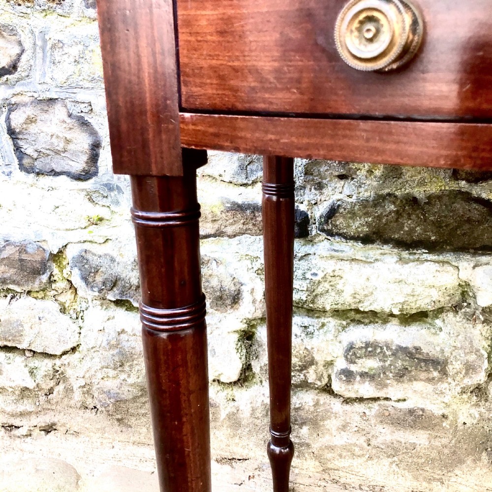 A George III mahogany bowfront side table View VII