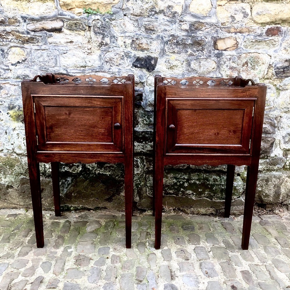 A pair of late 19th century mahogany bedside tables