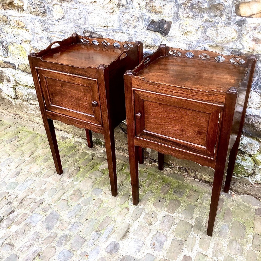 A pair of late 19th century mahogany bedside tables View II