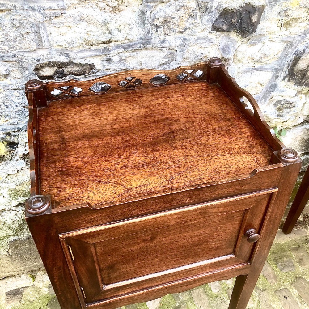 A pair of late 19th century mahogany bedside tables View V