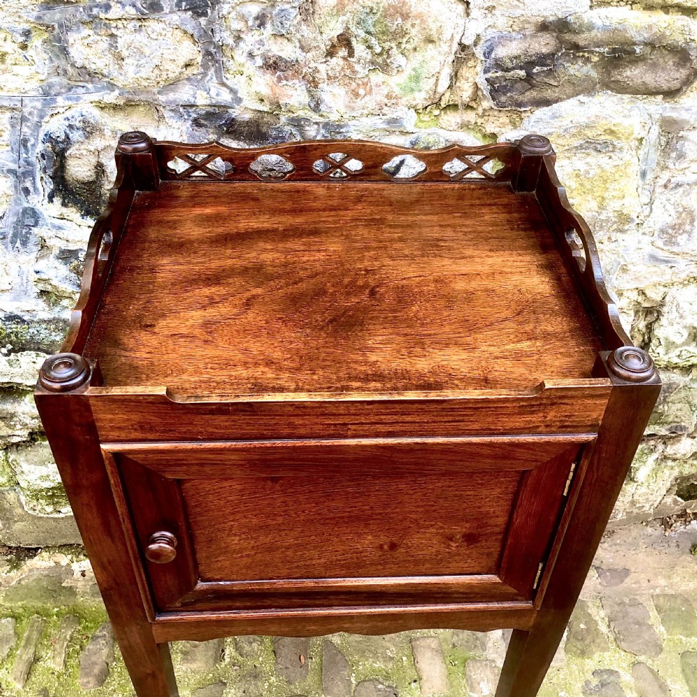 A pair of late 19th century mahogany bedside tables View VI