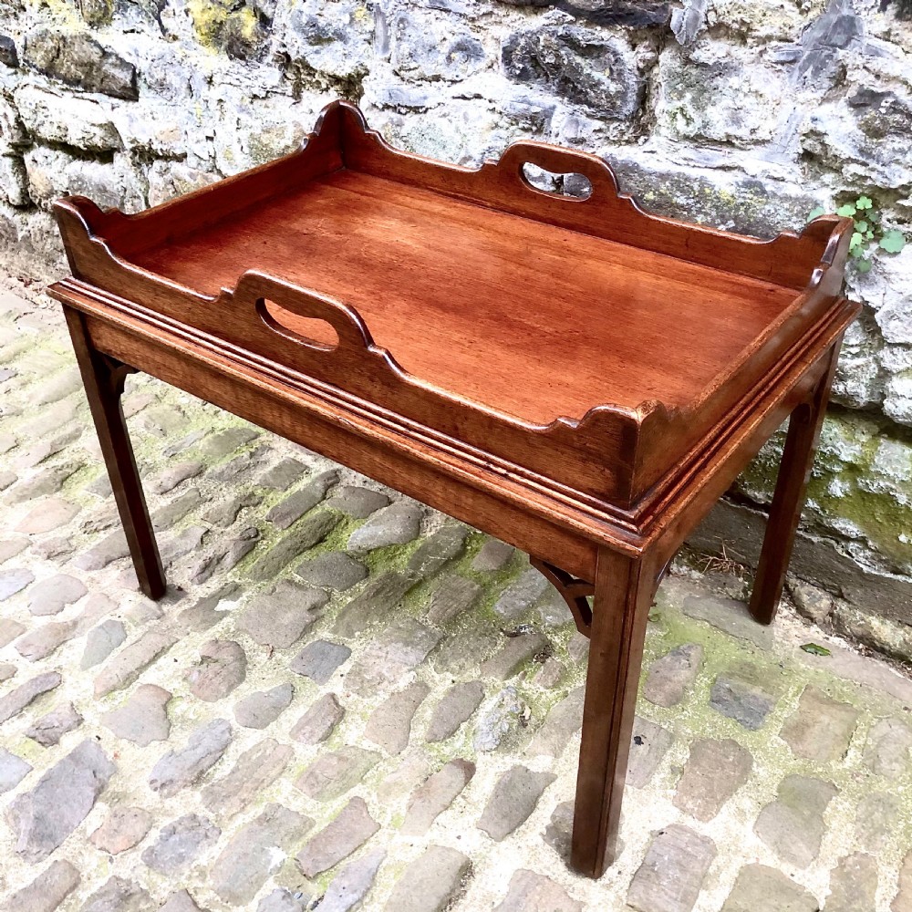 A small mahogany tray-top coffee table  View II