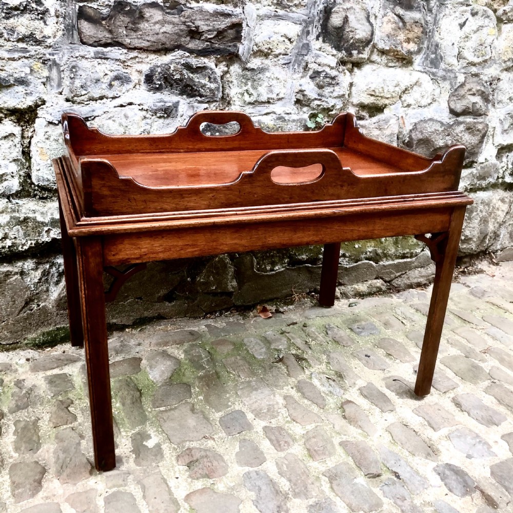 A small mahogany tray-top coffee table  View III