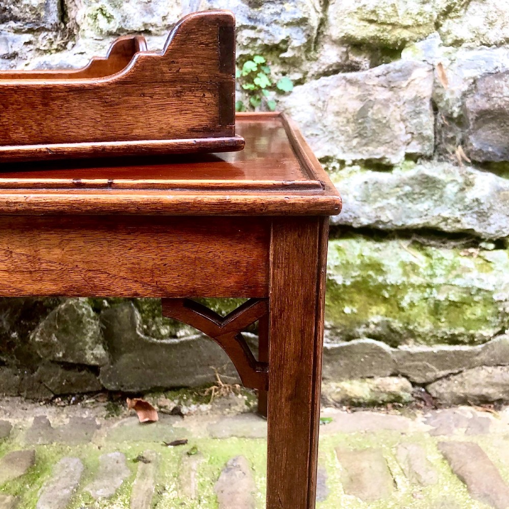 A small mahogany tray-top coffee table  View V