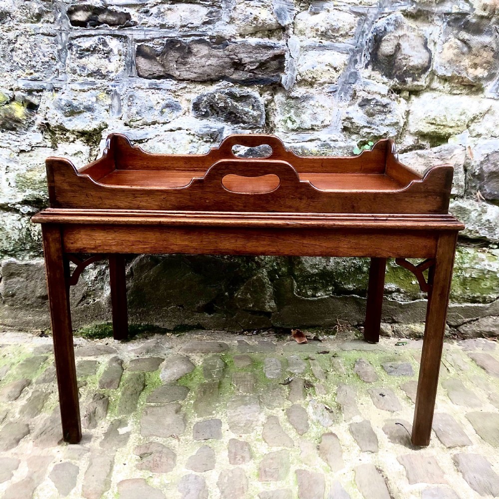 A small mahogany tray-top coffee table  View VI
