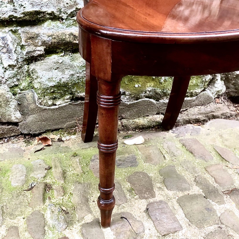 A George III mahogany hall chair  View V