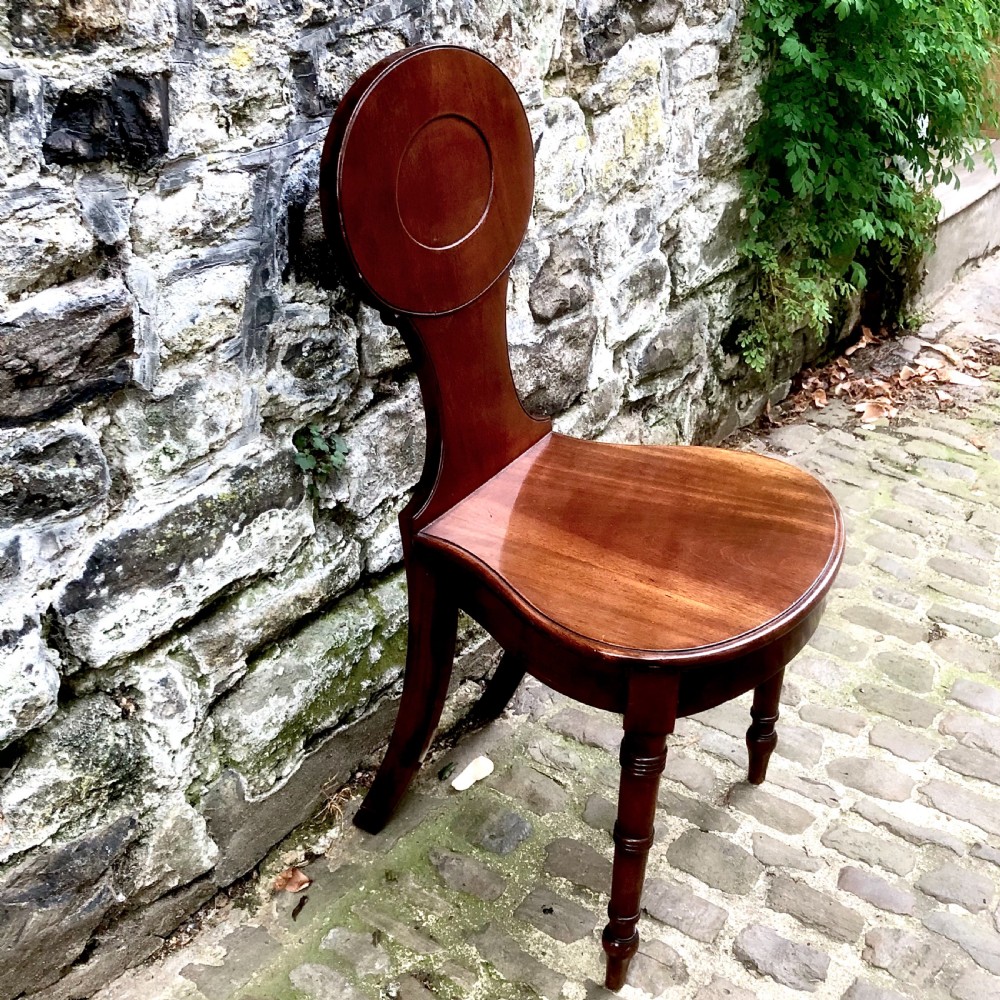 A George III mahogany hall chair  View VI