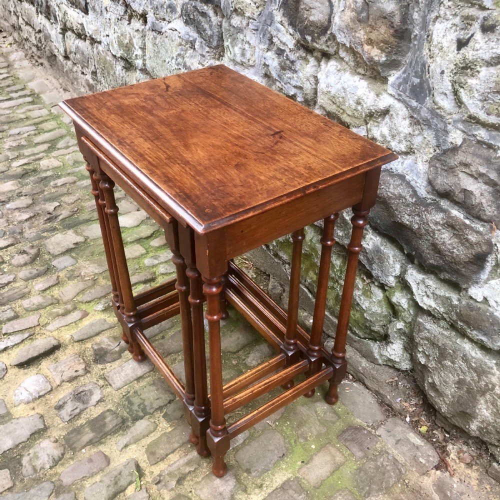A late 19th century mahogany nest of three tables  View III