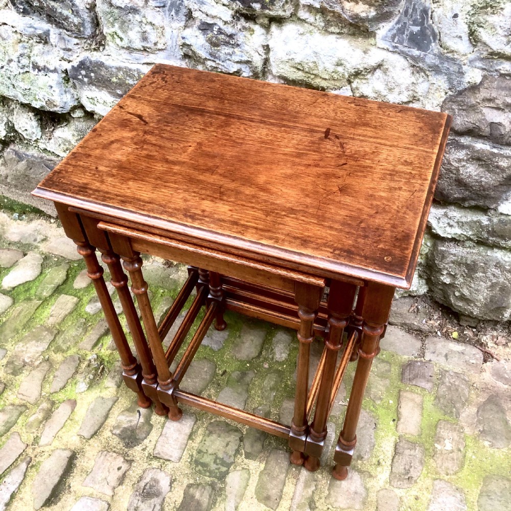A late 19th century mahogany nest of three tables  View IV